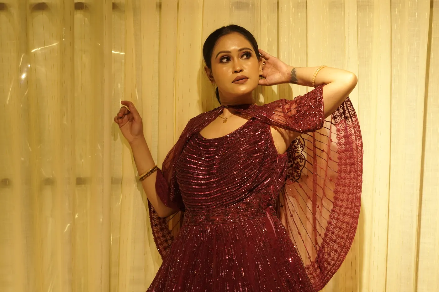 Couture red gown fashion pose