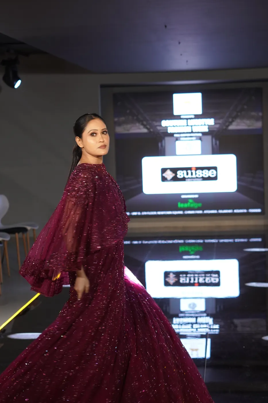 Red gown runway stage appearance